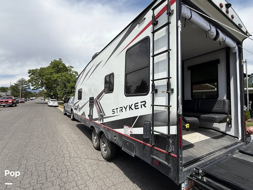 2022 Cruiser RV Stryker 2313 - Used Toy Hauler For Sale by Pop RVs in West Valley City, Utah features Leveling Jacks, Air Conditioning