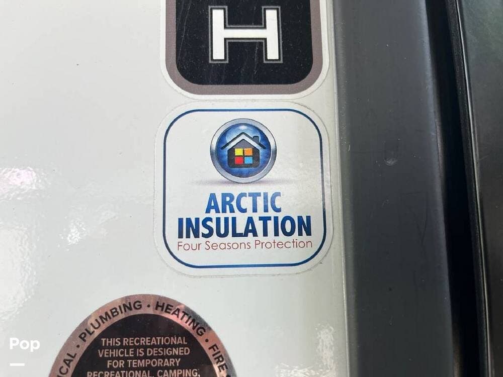 2023 Grand Design Imagine 3210BH - Used Travel Trailer For Sale by Pop RVs in Crown Point, New York features Slideout, Leveling Jacks, Air Conditioning, Awning