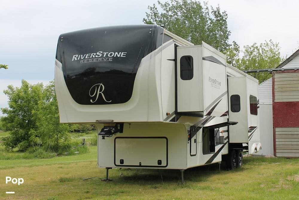 2022 Forest River RiverStone Reserve 3850RK - Used Fifth Wheel For Sale by Pop RVs in Crown Point, Indiana features Air Conditioning, Leveling Jacks, Slideout, Awning