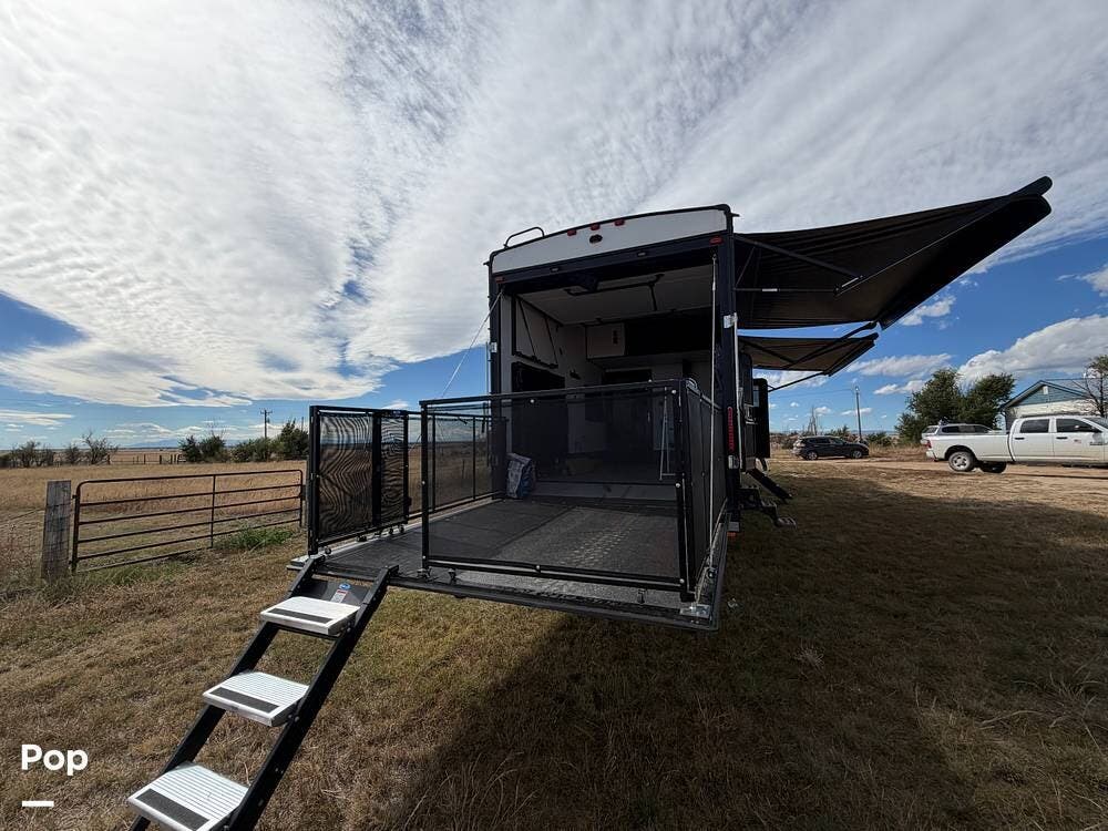 2021 Forest River Vengeance ROGUE ARMORED 4007-G2 - Used Toy Hauler For Sale by Pop RVs in Colorado Springs, Colorado features Awning, Leveling Jacks, Generator, Slideout, Air Conditioning