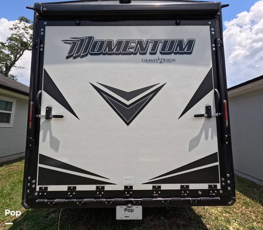 2021 Grand Design Momentum 25G - Used Toy Hauler For Sale by Pop RVs in Jacksonville, Florida features Air Conditioning, Slideout, Leveling Jacks, Awning, Generator