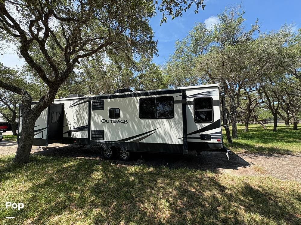 2019 Keystone Outback 330RL - Used Travel Trailer For Sale by Pop RVs in Rockport, Texas features Awning, Slideout, Leveling Jacks, Air Conditioning