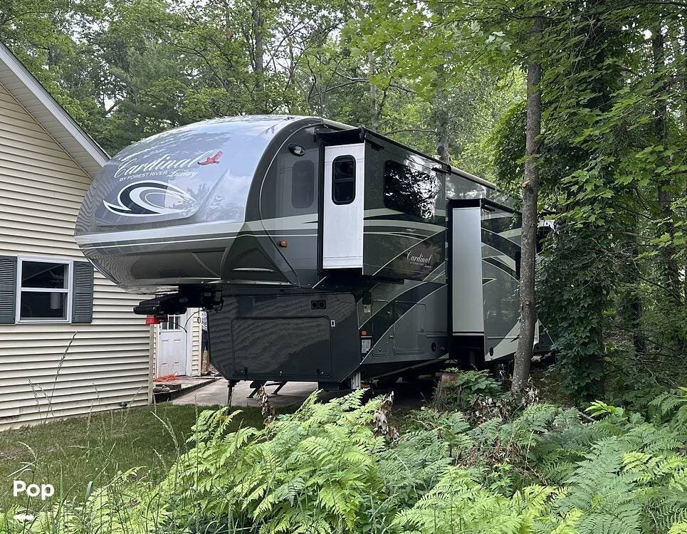 2019 Forest River Cardinal Luxury 3700FLX - Used Fifth Wheel For Sale by Pop RVs in Grayling, Michigan features Slideout, Leveling Jacks, Awning, Air Conditioning