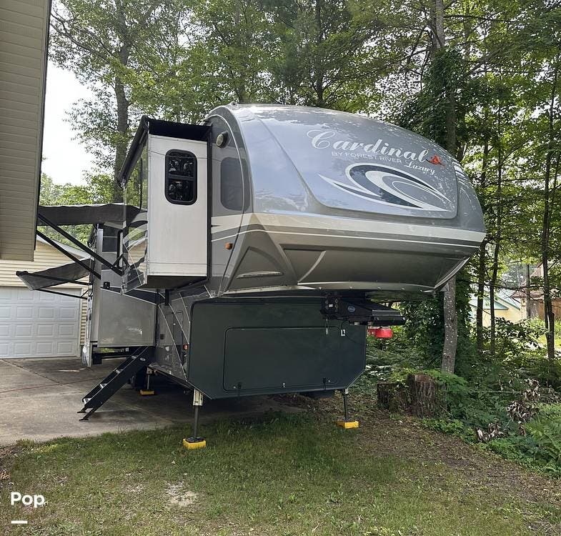 2019 Forest River Cardinal Luxury 3700FLX - Used Fifth Wheel For Sale by Pop RVs in Grayling, Michigan features Leveling Jacks, Air Conditioning, Awning, Slideout