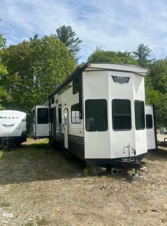 2022 Forest River Wildwood Grand Lodge 42DL - Used Travel Trailer For Sale by Pop RVs in New Ipswich, New Hampshire features Leveling Jacks, Awning, Slideout, Air Conditioning