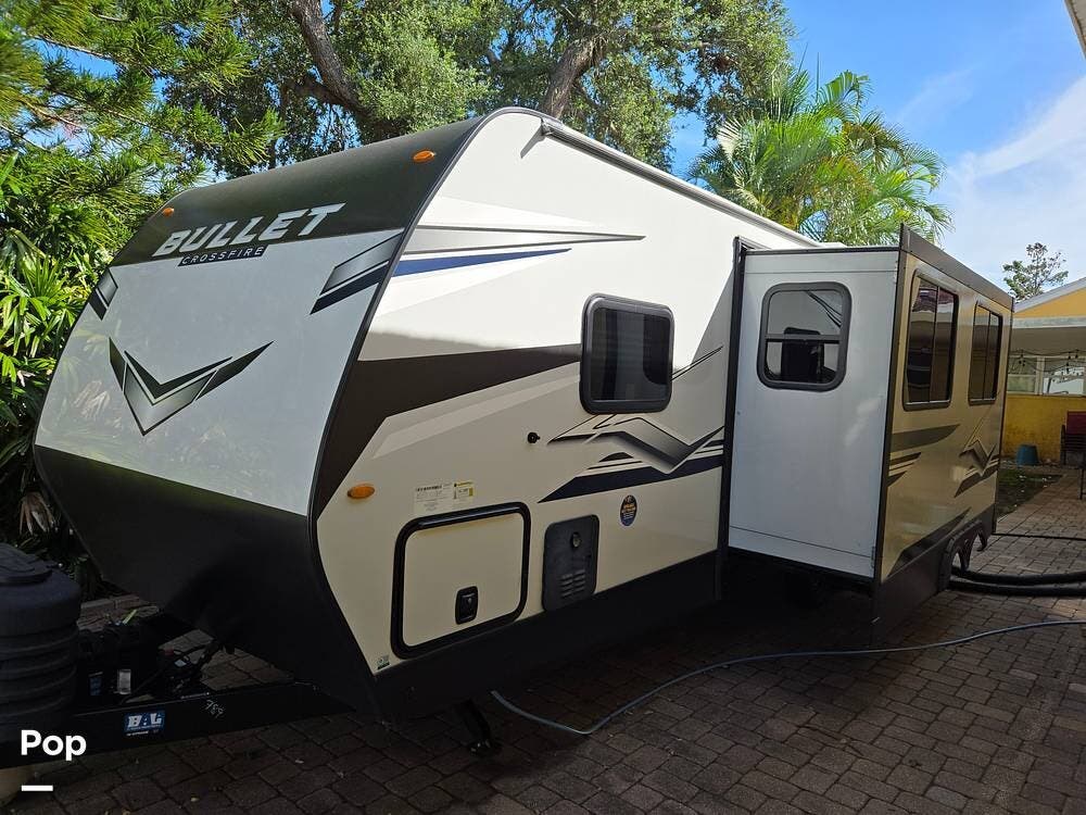 2024 Keystone Bullet Crossfire 2680BH - Used Travel Trailer For Sale by Pop RVs in Saint Petersburg, Florida features Air Conditioning, Slideout, Leveling Jacks, Awning