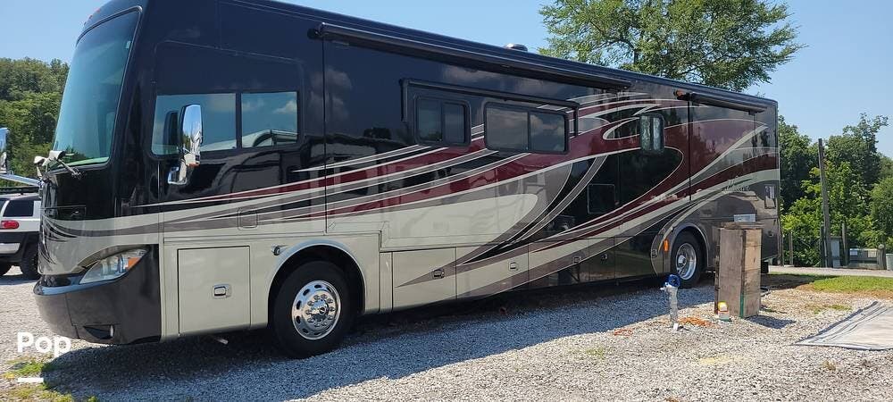 2013 Tiffin Phaeton 40 QTH - Used Diesel Pusher For Sale by Pop RVs in Dandridge, Tennessee features Slideout, Leveling Jacks, Generator, Air Conditioning, Awning