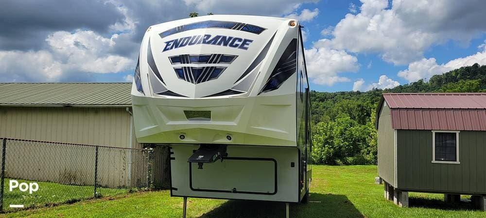 2018 Dutchmen Endurance 3456 - Used Toy Hauler For Sale by Pop RVs in Huntsville, Tennessee features Air Conditioning, Leveling Jacks, Slideout, Awning