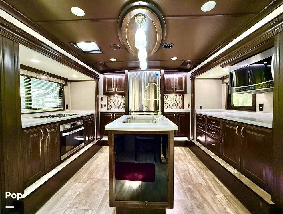 2019 Forest River RiverStone 39FKTH - Used Toy Hauler For Sale by Pop RVs in Bonney Lake, Washington features Awning, Slideout, Generator, Leveling Jacks, Air Conditioning