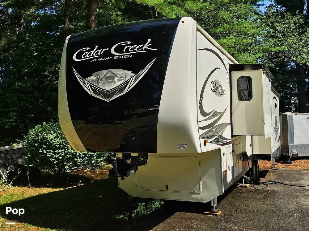 2020 Forest River Cedar Creek 38FBD - Used Fifth Wheel For Sale by Pop RVs in Granby, Connecticut features Leveling Jacks, Slideout, Awning, Air Conditioning