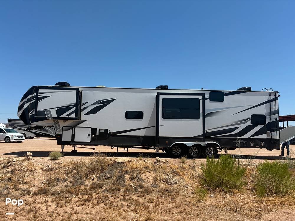 2020 Dutchmen Voltage 4075 - Used Toy Hauler For Sale by Pop RVs in Casa Grande, Arizona features Leveling Jacks, Slideout, Awning, Air Conditioning, Generator