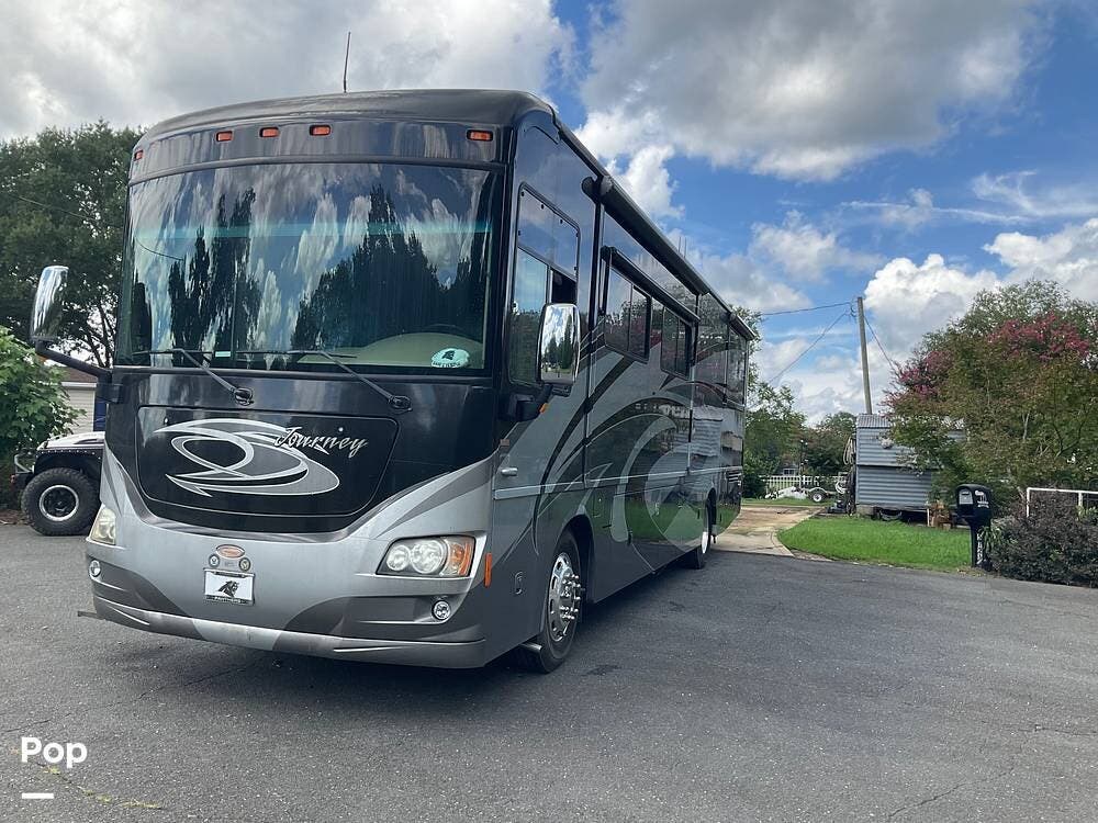 2012 Winnebago Journey 36M - Used Diesel Pusher For Sale by Pop RVs in Clover, South Carolina features Generator, Leveling Jacks, Awning, Air Conditioning, Slideout