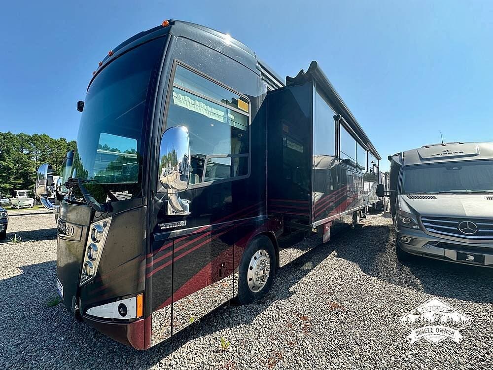 2016 Winnebago Grand Tour 42QL - Used Diesel Pusher For Sale by Pop RVs in Ocean Isle Beach, North Carolina features Air Conditioning, Awning, Generator, Leveling Jacks, Slideout