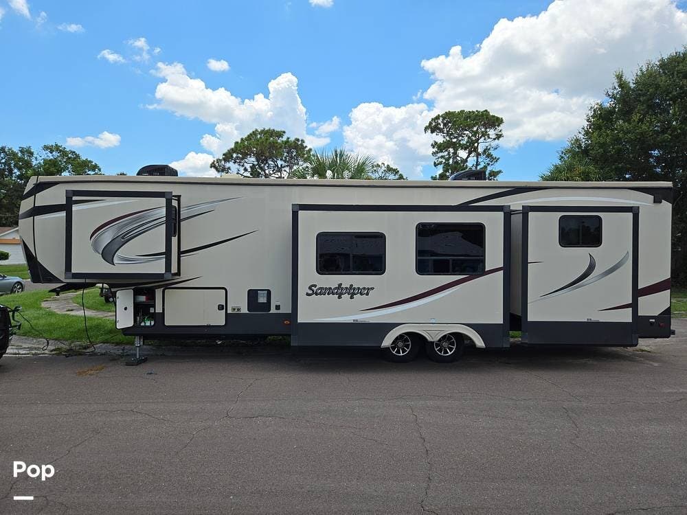 2018 Forest River Sandpiper 383RBLOK - Used Fifth Wheel For Sale by Pop RVs in St Petersburg, Florida features Air Conditioning, Awning, Leveling Jacks, Slideout