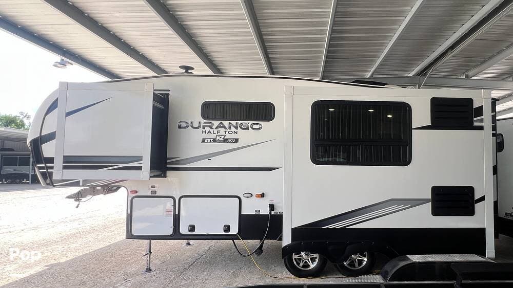 2022 K-Z Durango 230RKD - Used Fifth Wheel For Sale by Pop RVs in Willis, Texas features Leveling Jacks, Slideout, Awning, Air Conditioning