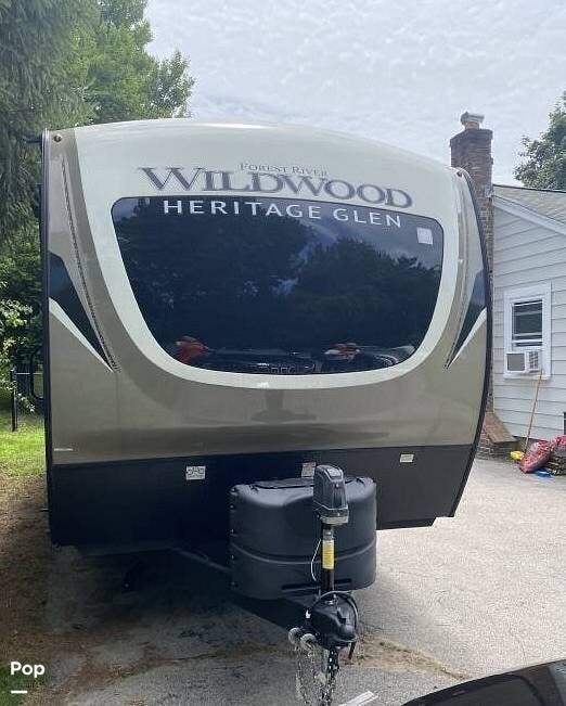 2023 Forest River Wildwood 270FKS - Used Travel Trailer For Sale by Pop RVs in Walpole, Massachusetts features Leveling Jacks, Slideout, Air Conditioning, Awning