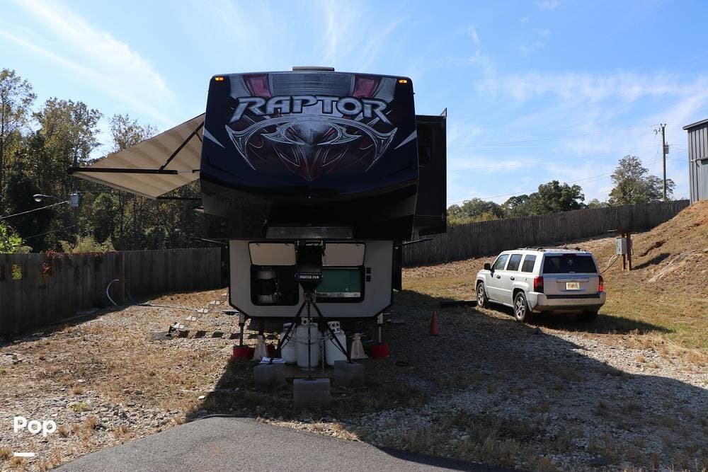 2017 Keystone Raptor 425TS - Used Toy Hauler For Sale by Pop RVs in Gainesville, Georgia features Slideout, Leveling Jacks, Awning, Generator, Air Conditioning
