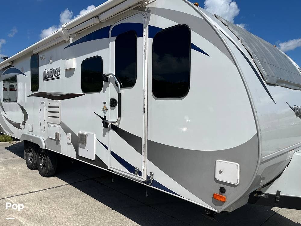 2019 Lance Lance 2465 - Used Travel Trailer For Sale by Pop RVs in Independence, Missouri features Slideout, Air Conditioning, Awning