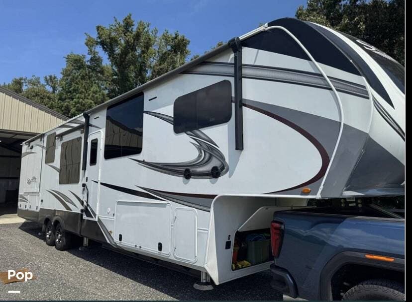 2022 Grand Design Solitude 390RK - Used Fifth Wheel For Sale by Pop RVs in Dameron, Maryland features Air Conditioning, Leveling Jacks, Slideout, Awning