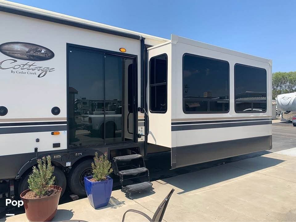 2020 Forest River Cedar Creek 40CCK - Used Travel Trailer For Sale by Pop RVs in Fairfield, California features Awning, Air Conditioning, Leveling Jacks, Slideout