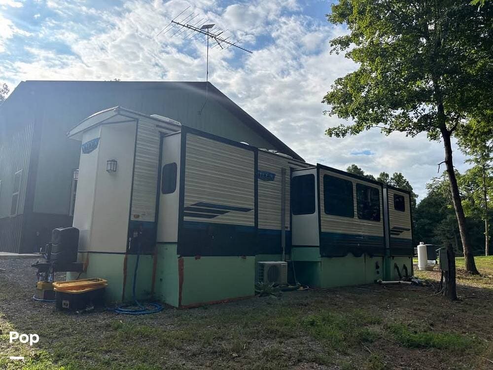 2023 Forest River Salem Villa 42QBQ - Used Park Model For Sale by Pop RVs in Shelbyville, Tennessee features Air Conditioning, Leveling Jacks, Slideout, Awning