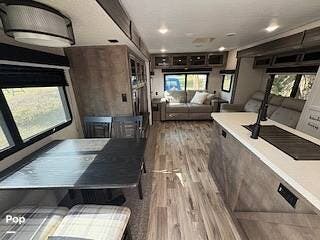 2022 Venture RV SportTrek 343VIK - Used Travel Trailer For Sale by Pop RVs in Palm Bay, Florida features Air Conditioning, Slideout, Awning