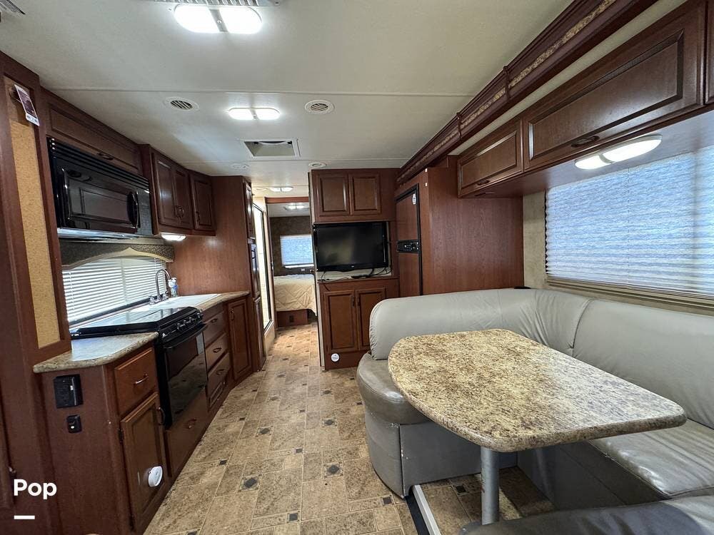 2014 Thor Motor Coach Hurricane 29X - Used Class A For Sale by Pop RVs in Temecula, California features Slideout, Generator, Awning, Air Conditioning, Leveling Jacks