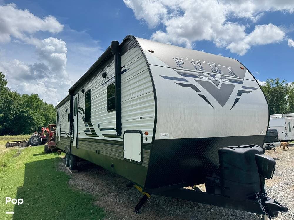 2022 Palomino Puma 32MBDS - Used Travel Trailer For Sale by Pop RVs in Selma, North Carolina features Air Conditioning, Awning, Slideout