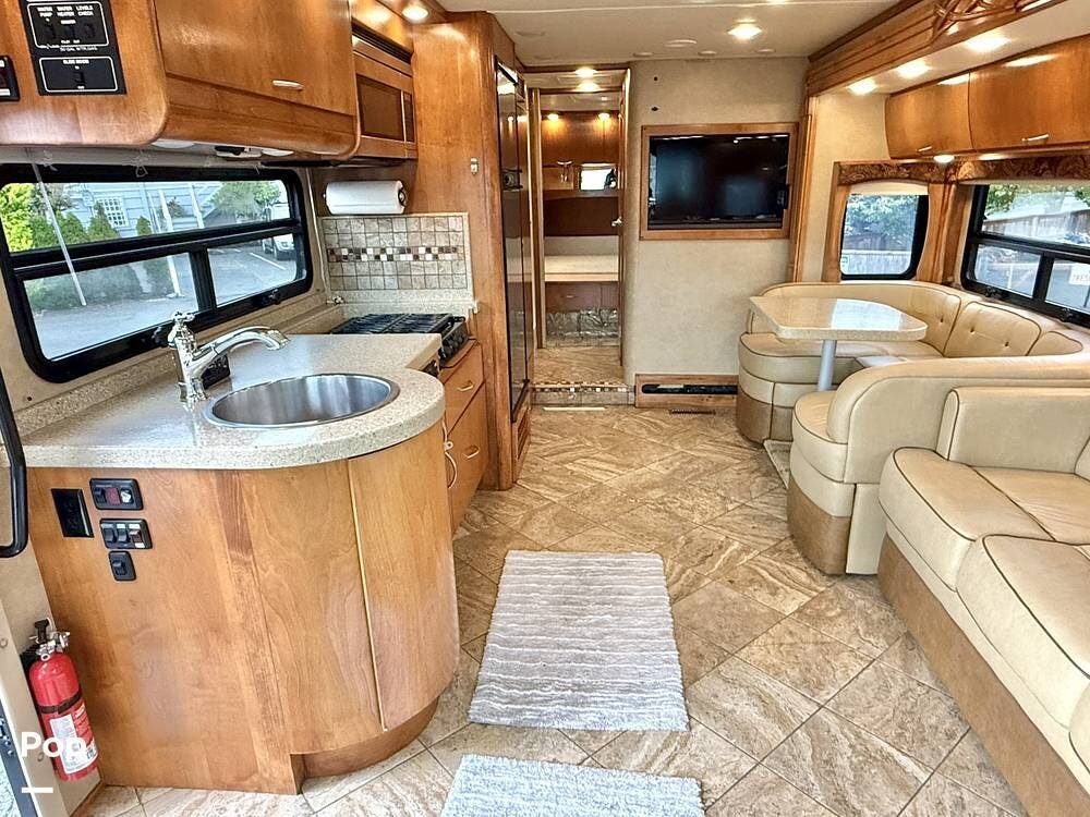 2011 Monaco RV Vesta 32PBS - Used Diesel Pusher For Sale by Pop RVs in University Place, Washington features Awning, Leveling Jacks, Slideout, Generator, Air Conditioning