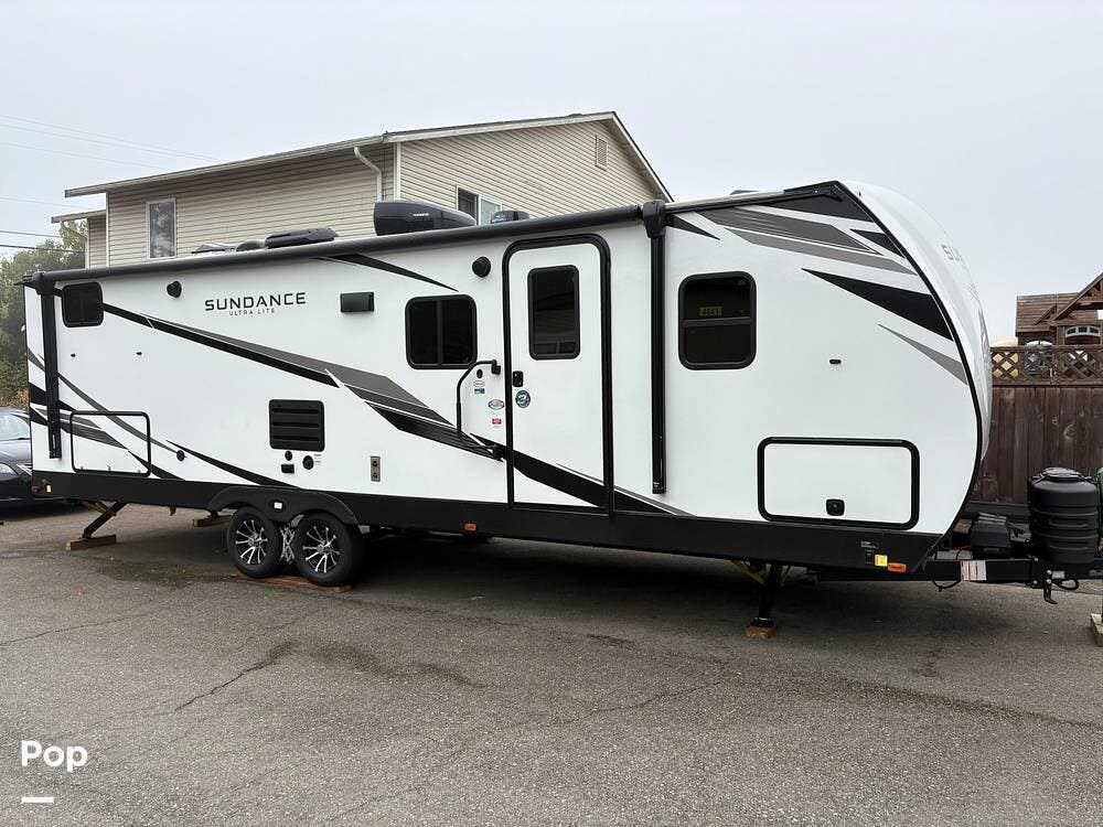 2024 Heartland Sundance Ultra Lite 291QB - Used Travel Trailer For Sale by Pop RVs in Everett, Washington features Slideout, Air Conditioning, Leveling Jacks, Awning