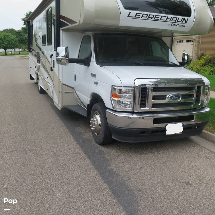 2021 Coachmen Leprechaun 319 MB - Used Class C For Sale by Pop RVs in Bismarck, North Dakota features Leveling Jacks, Awning, Slideout, Air Conditioning, Generator