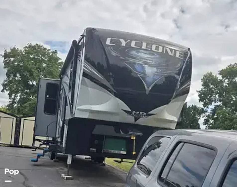 2018 Heartland Cyclone 4005 - Used Toy Hauler For Sale by Pop RVs in Plattsburg, Missouri features Leveling Jacks, Generator, Slideout, Awning, Air Conditioning