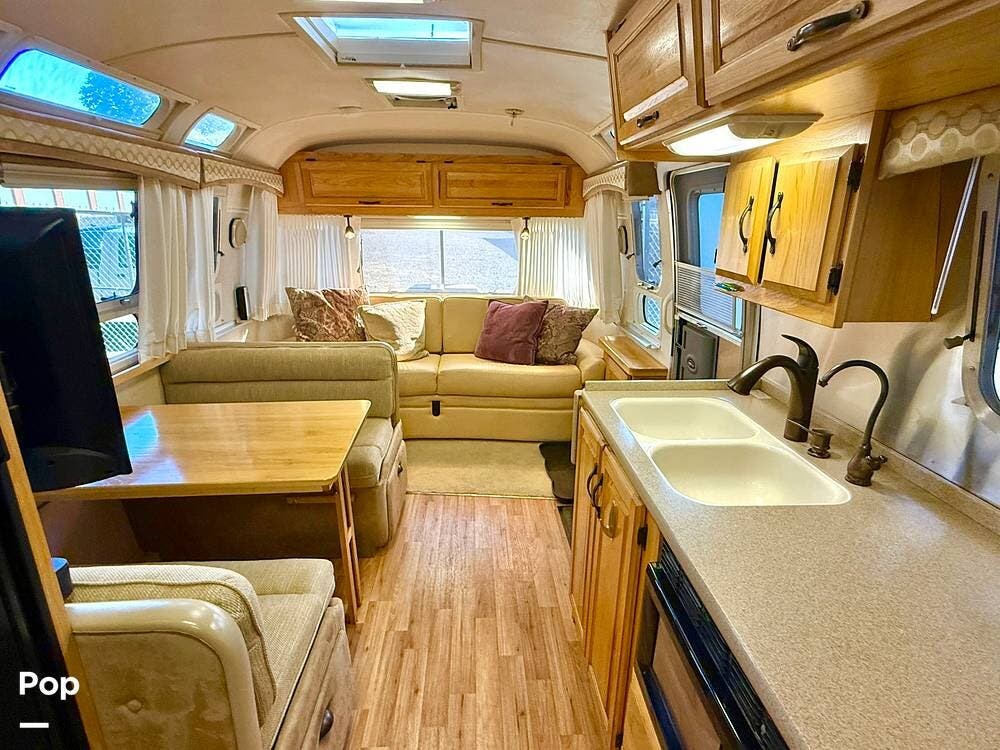 2012 Airstream Classic Limited 31 - Used Travel Trailer For Sale by Pop RVs in Elma, Washington features Leveling Jacks, Air Conditioning, Awning