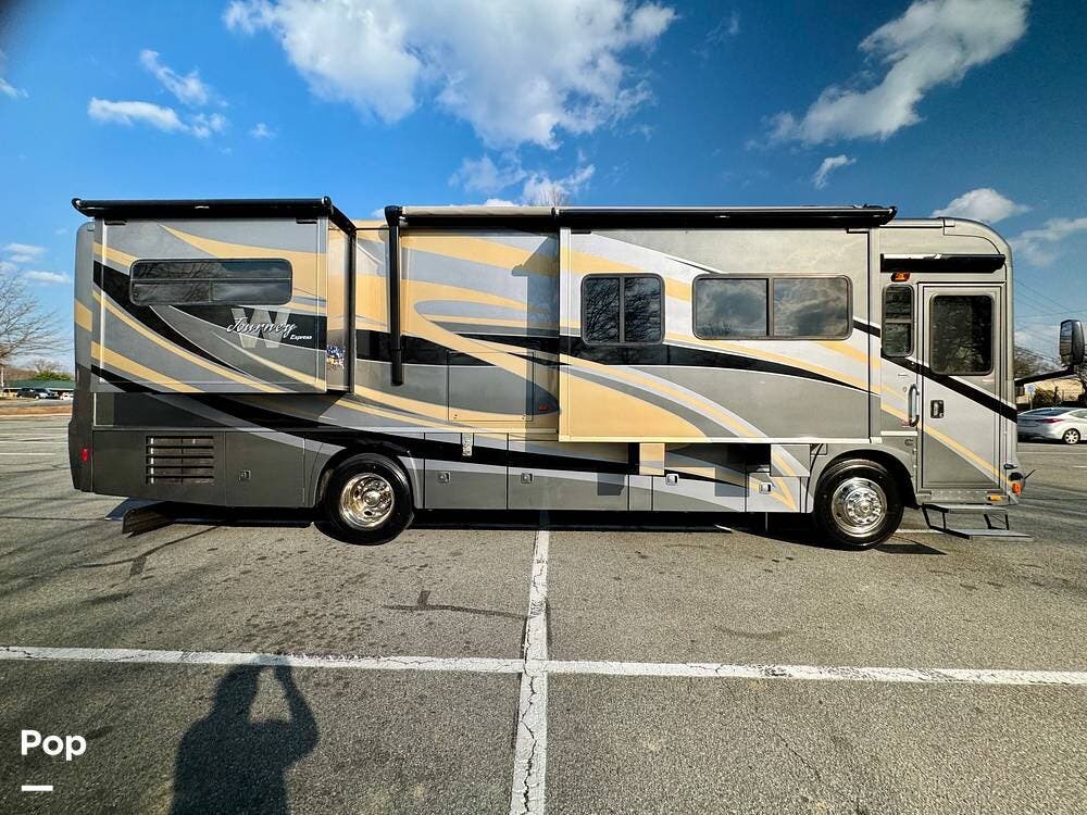 2010 Winnebago Journey Express 34Y - Used Diesel Pusher For Sale by Pop RVs in Gastonia, North Carolina features Awning, Generator, Leveling Jacks, Air Conditioning, Slideout