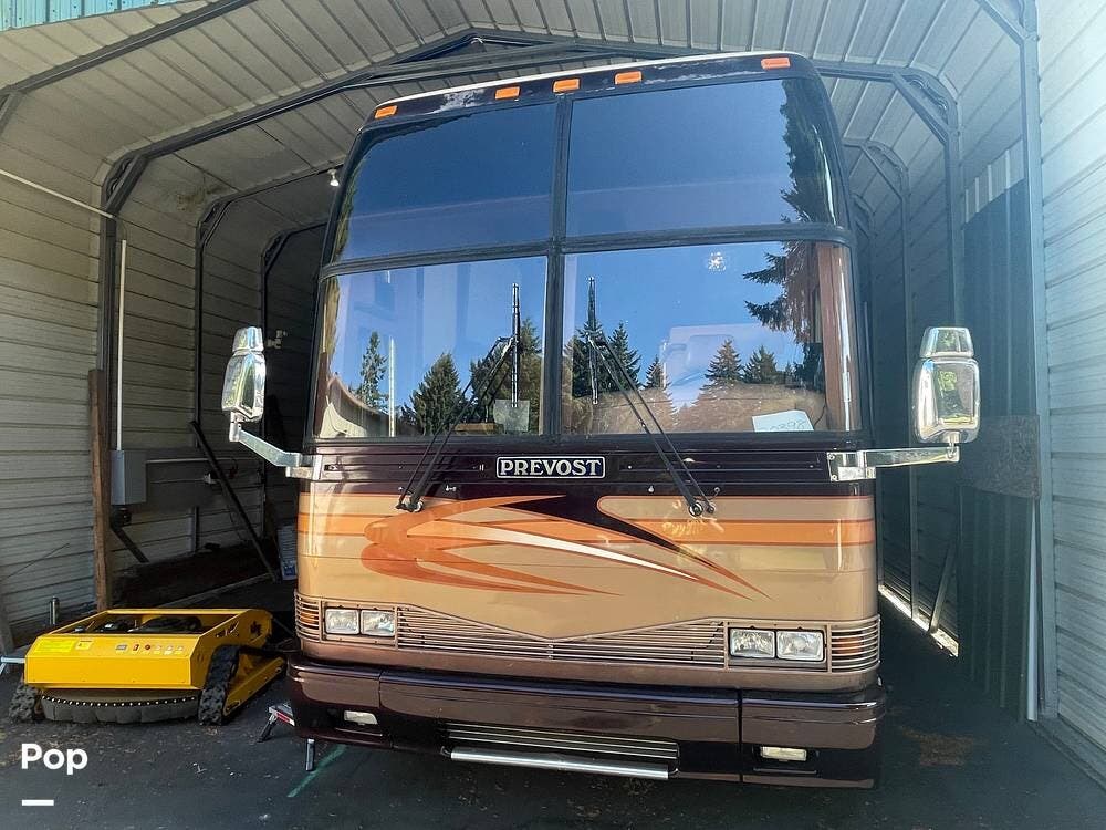 2001 Prevost Marathon Prevost  H3-45 - Used Diesel Pusher For Sale by Pop RVs in Longview, Washington features Awning, Leveling Jacks, Generator, Air Conditioning