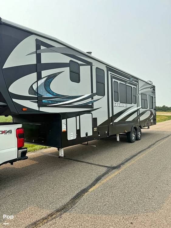 2018 Heartland Cyclone HD 3611 JS - Used Toy Hauler For Sale by Pop RVs in Anamoose, North Dakota features Generator, Awning, Air Conditioning, Leveling Jacks, Slideout