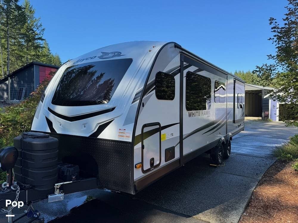 2024 Jayco White Hawk 26FK - Used Travel Trailer For Sale by Pop RVs in Port Orchard, Washington features Awning, Slideout, Leveling Jacks, Air Conditioning