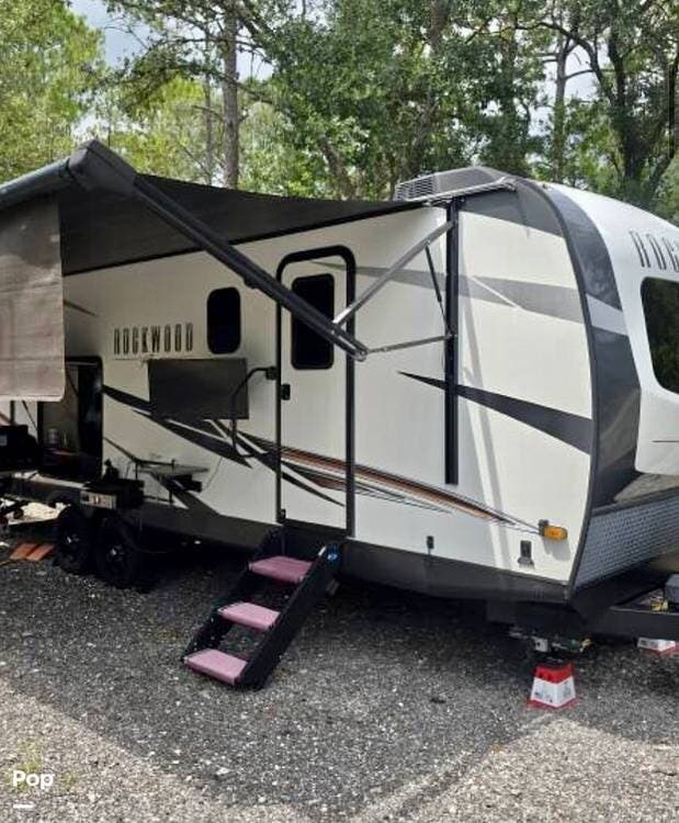 2022 Forest River Rockwood 2614BS - Used Travel Trailer For Sale by Pop RVs in Osteen, Florida features Air Conditioning, Awning, Leveling Jacks, Slideout