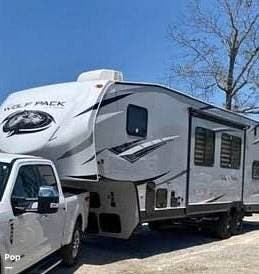 2021 Forest River Wolf Pack 315PACK12 - Used Toy Hauler For Sale by Pop RVs in Sophia, North Carolina features Air Conditioning, Awning, Generator, Slideout