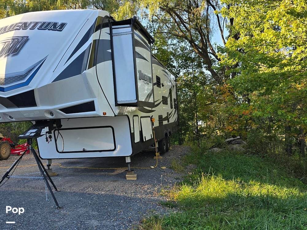 2017 Grand Design Momentum 328M - Used Toy Hauler For Sale by Pop RVs in Esperance, New York features Leveling Jacks, Awning, Generator, Slideout, Air Conditioning