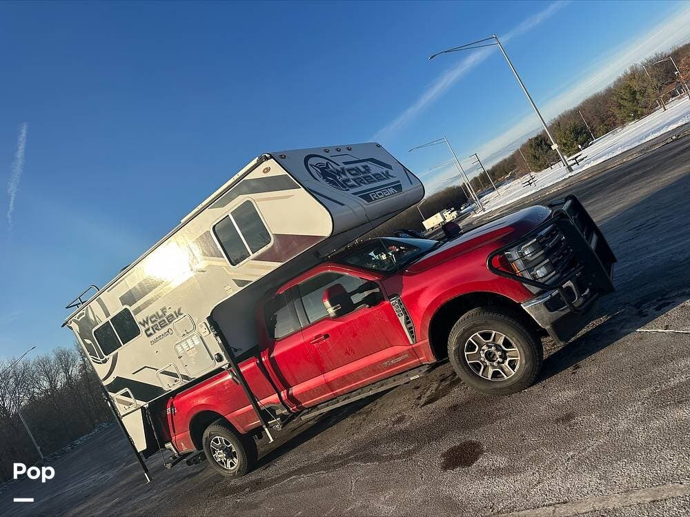 2024 Northwood Wolf Creek 890 - Used Truck Camper For Sale by Pop RVs in Adams, Wisconsin features Awning