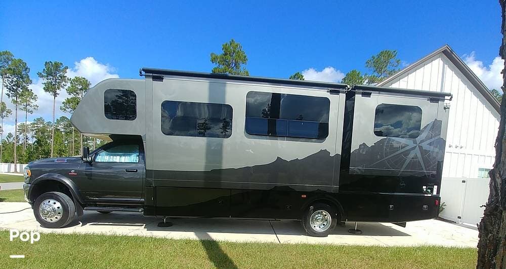 2023 Dynamax Corp Isata 5 Series 30FW 4WD - Used Super C For Sale by Pop RVs in Hilliard, Florida features Slideout, Air Conditioning, Awning, Generator, Leveling Jacks