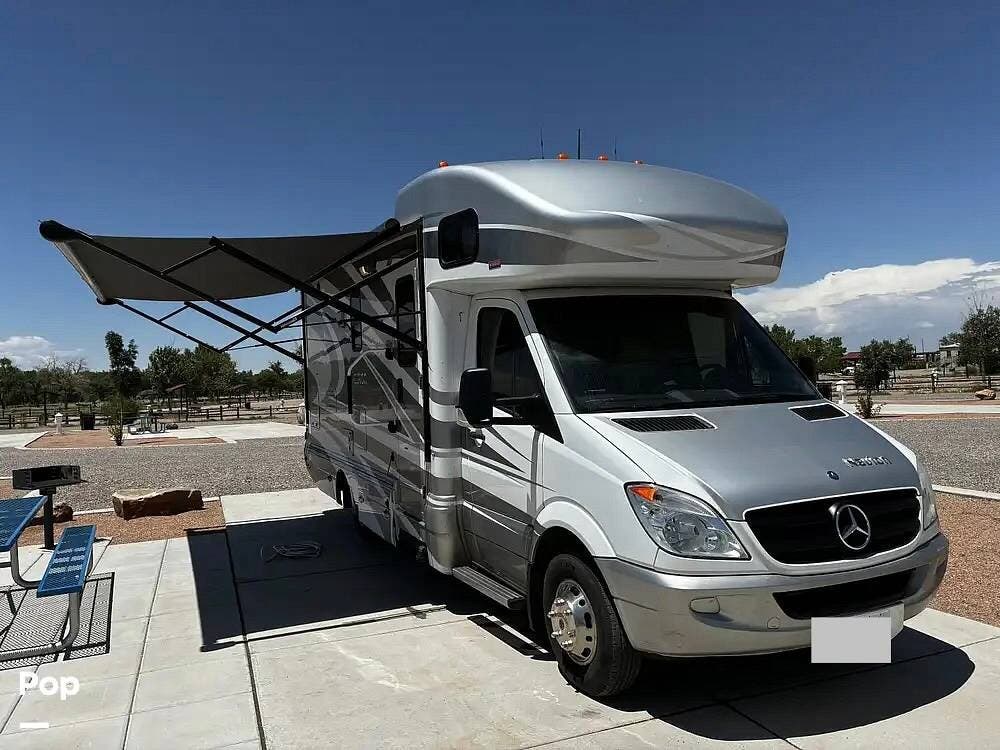 2012 Itasca Navion 24M - Used Class C For Sale by Pop RVs in Los Lunas, New Mexico features Air Conditioning, Slideout, Generator, Awning