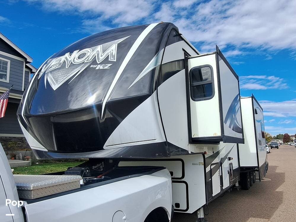 2017 K-Z Venom 3911TK - Used Toy Hauler For Sale by Pop RVs in Fort Lupton, Colorado features Generator, Leveling Jacks, Air Conditioning, Slideout, Awning