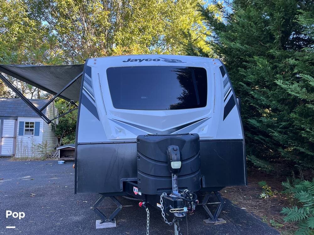 2021 Jayco White Hawk 26RK - Used Travel Trailer For Sale by Pop RVs in Centereach, New York features Leveling Jacks, Awning, Slideout, Air Conditioning
