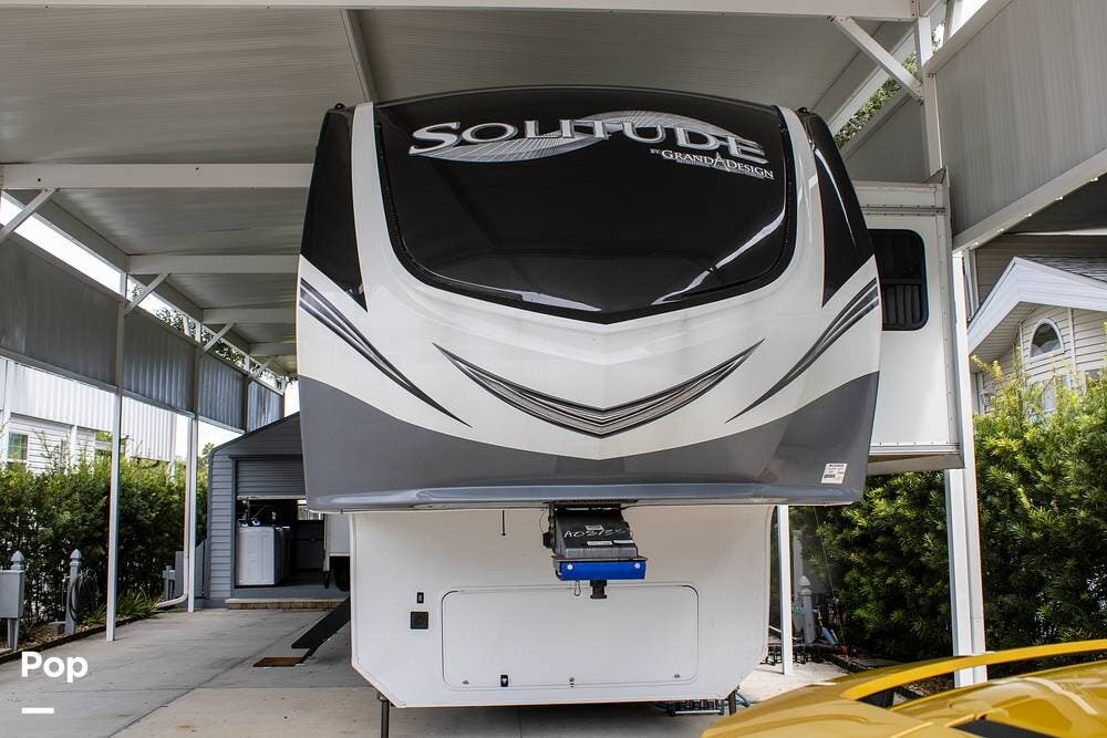 2022 Grand Design Solitude 378MBS - Used Fifth Wheel For Sale by Pop RVs in Davenport, Florida features Generator, Air Conditioning, Leveling Jacks, Slideout, Awning