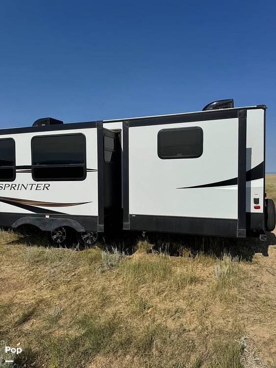2021 Keystone Sprinter 341BIK - Used Travel Trailer For Sale by Pop RVs in Laramie, Wyoming features Air Conditioning, Slideout, Leveling Jacks, Awning