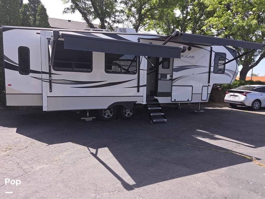 2022 Keystone Cougar 316RLS - Used Fifth Wheel For Sale by Pop RVs in Mountain Home, Idaho features Air Conditioning, Slideout, Awning, Leveling Jacks