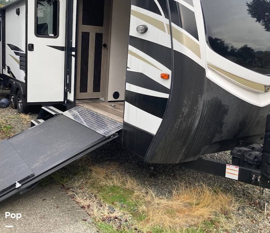 2021 Keystone Outback 324CG - Used Toy Hauler For Sale by Pop RVs in Sumner, Washington features Slideout, Air Conditioning, Leveling Jacks, Awning
