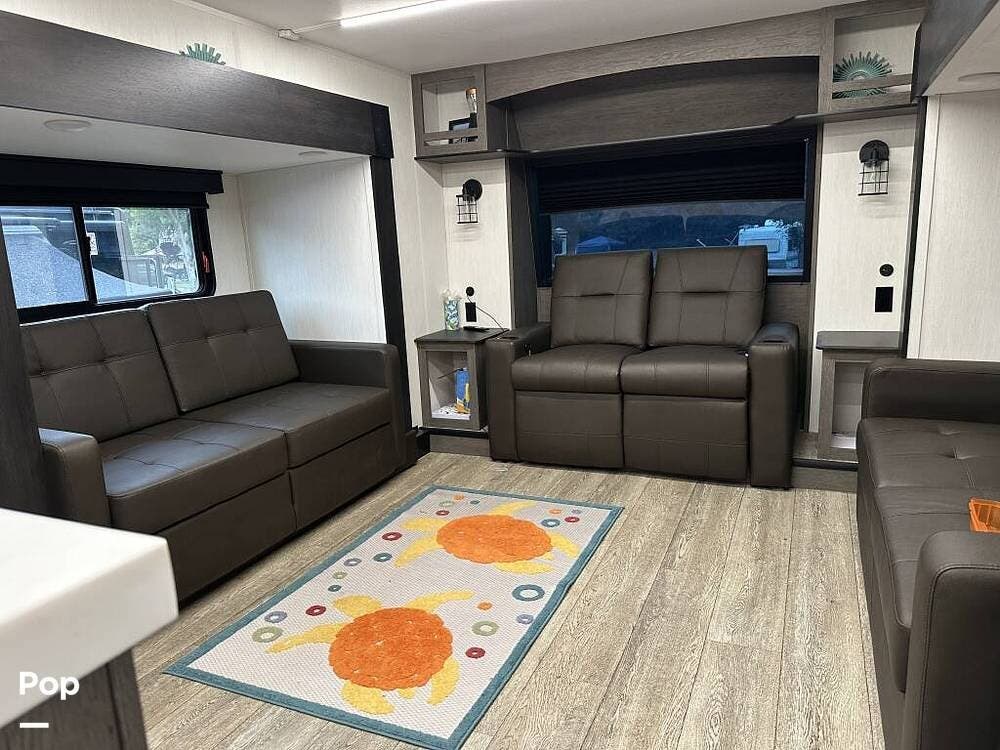 2025 Cherokee Arctic Wolf 3950SUITE - Used Fifth Wheel For Sale by Pop RVs in Franklin, Massachusetts features Awning, Slideout, Air Conditioning, Leveling Jacks